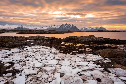 Sunset on the coast of Laukvik in winter