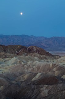 Full moon over the Panamint Range and the Death Valley at dawn