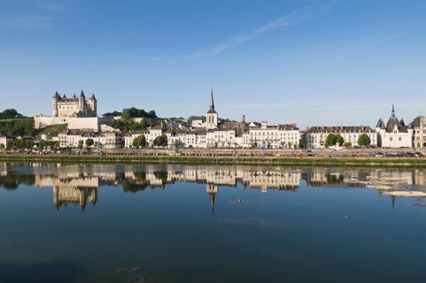 Loire river and the historic centre of Saumur with the castle and the Church of Saint-Pierre