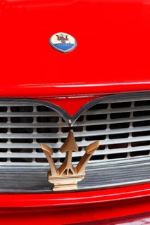 Maserati logo and emblem of trident on a car