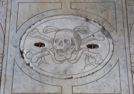 Marble slab with a skull relief