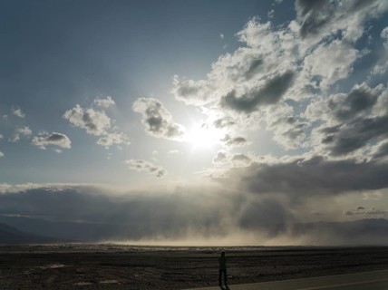 A sand storm over the Mesquite Flat Sand Dunes and the Panamint Range in the evening