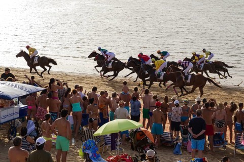 Horse race at the beach of Sanlucar de Barrameda at the Guadalquivir river mouth
