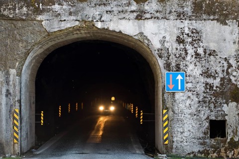 Exit of a single-track tunnel between Anir and Arnafjorour