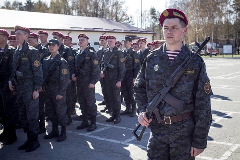 Swearing-in ceremony of volunteers after a three-week military training