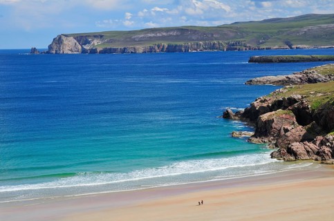 Sandy beach and rocks in Rispond Bay