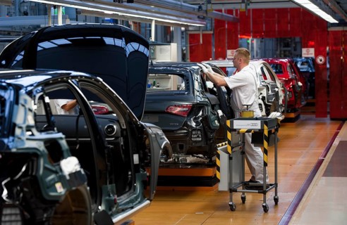 Man working on the production line of the Audi A3 at the Audi plant
