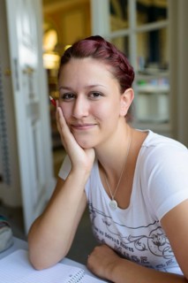 Student studying in the departmental library of the University of Hohenheim in Schloss Hohenheim Palace