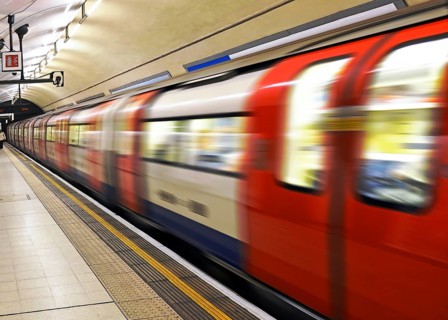 London underground train leaving Charing Cross station