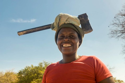 Woman wearing ax on her head