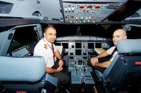 Pilots in the cockpit of an Airbus A-320