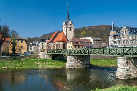 Weisse Elster River with the Untermhauser Brucke Bridge and St. Mary's Church