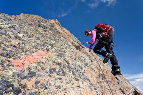 Mountain climber descending from Wilder Freiger Mountain