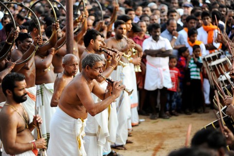 Musicians with trumpets at Hindu temple festival