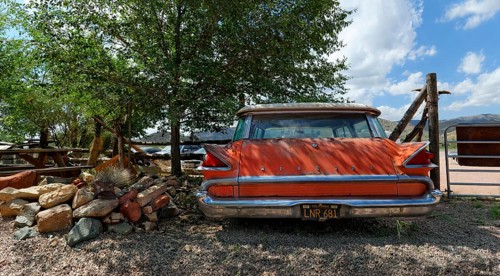 Old red Ford Mercury Commuter 1959