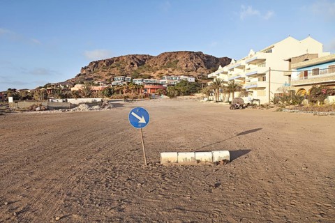 Traffic sign on a unpaved road