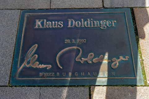 Plaque for the jazz musician Klaus Doldinger in the pavement of the 'Street of Fame'