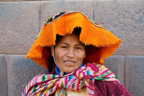 Smiling woman with headscarf and sling