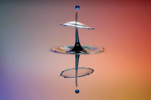 Three drops collide