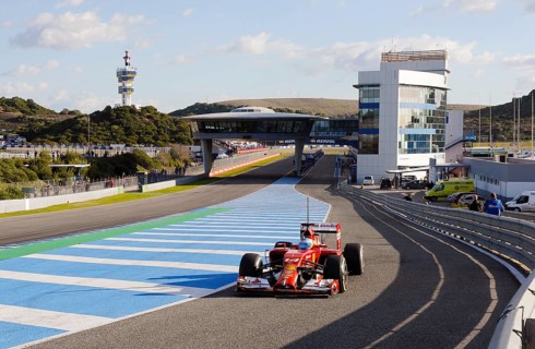 Fernando Alonso in the Ferrari F14 T in the pit lane exit