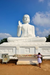 Buddha statue in the lotus position in the Buddhist monastery of Mihintale