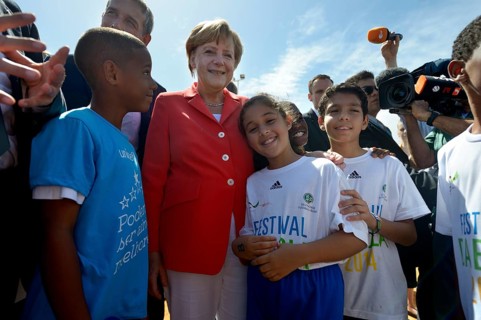 German Chancellor Angela Merkel visiting a social project for children and adolescents run by the German Society for International Cooperation