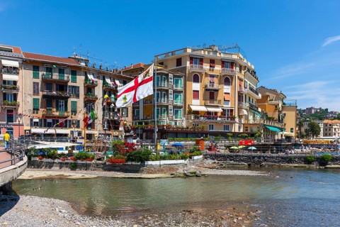 Hotels and sidewalk cafes on the Lungomare Vittorio Veneto at the port of Rapallo