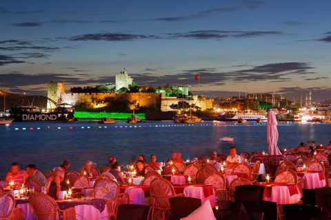 Restaurant in Kumbahce bay with Bodrum Castle