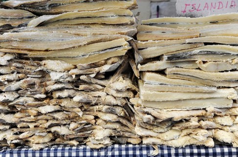 Icelandic salted dried cod stacked in market stall at the annual All Saints Market in Cocentaina