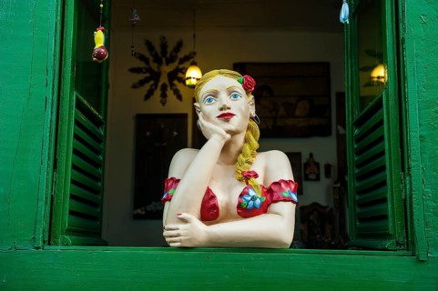Traditional puppet in a window