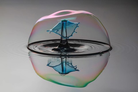 Three drops collide