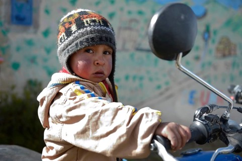 Small boy on a motorcycle