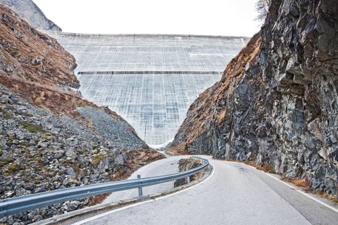 Road at the largest concrete dam in Switzerland