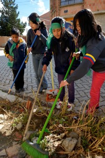 Children and young people cleaning the town on a day of action to protect the environment