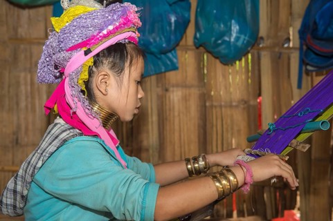 Karen girl weaving