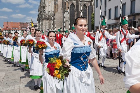 Fair maidens during a parade on Munsterplatz square