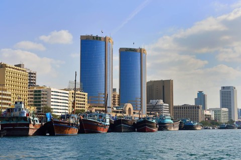 Dhows on the banks of Dubai Creek
