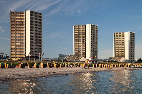High-rise buildings and wicker beach chairs on the south beach