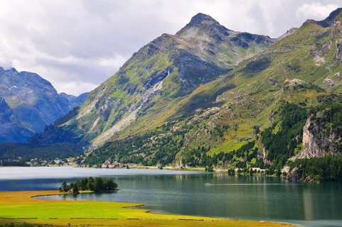 View over the alluvial land of the river Aua da Fedoz towards Plaun da Lej