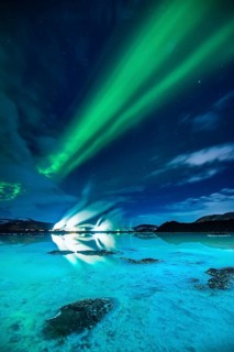 Geothermal plant with the Northern Lights at night