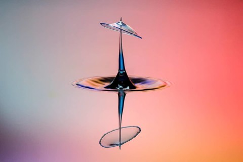 Three drops collide