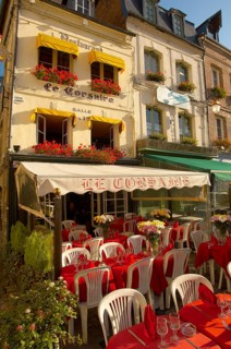Le Corsaire restaurant with terrace tables set ready for lunch