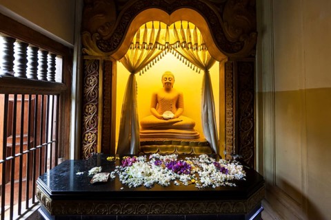 Buddha statue in the Temple of the Sacred Tooth Relic