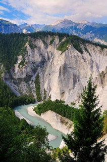 Limestone cliffs at a river bend of the Vorderrhein