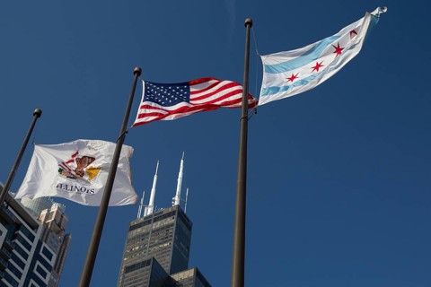 Flags in front of Willis Tower