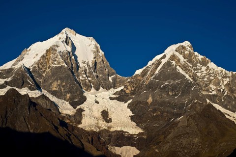Snow capped mountains in morning light