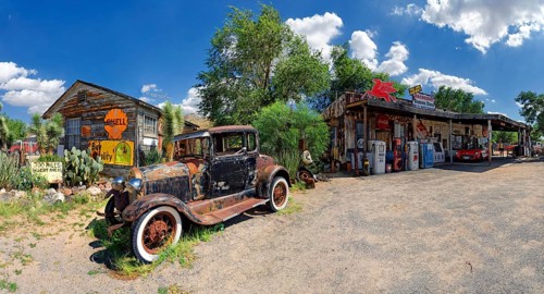 Historic station with an old rusty Ford Model A
