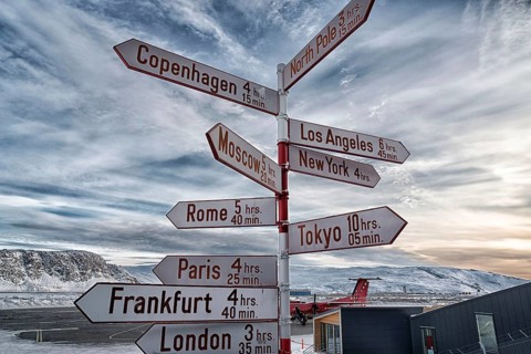 Guide with distances of international cities at the airport of Kangerlussuaq