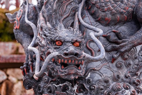 Dragon figure with red eyes