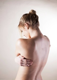 Bare back of a young woman